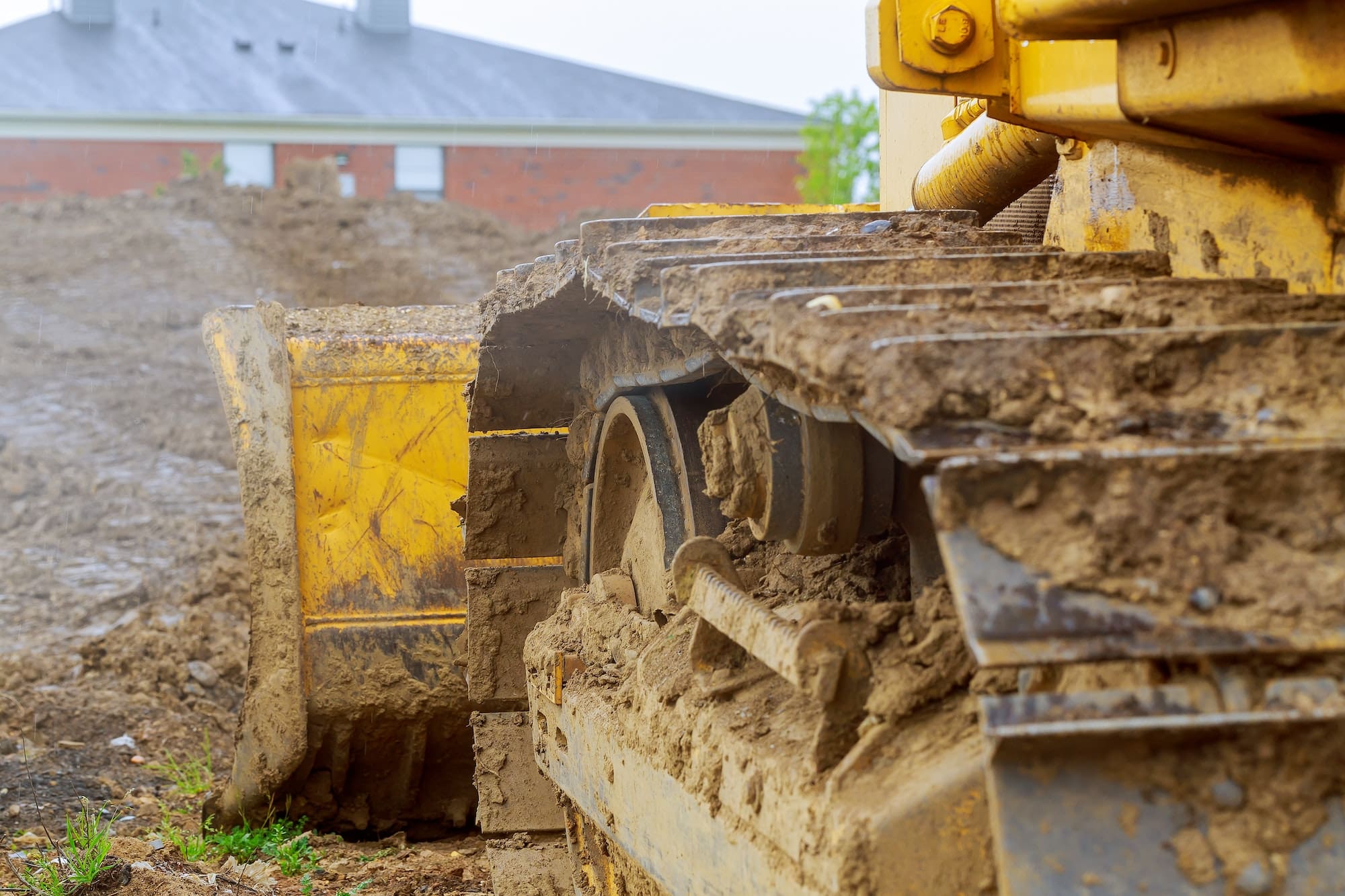 JPS machinery carrying out groundworks on site